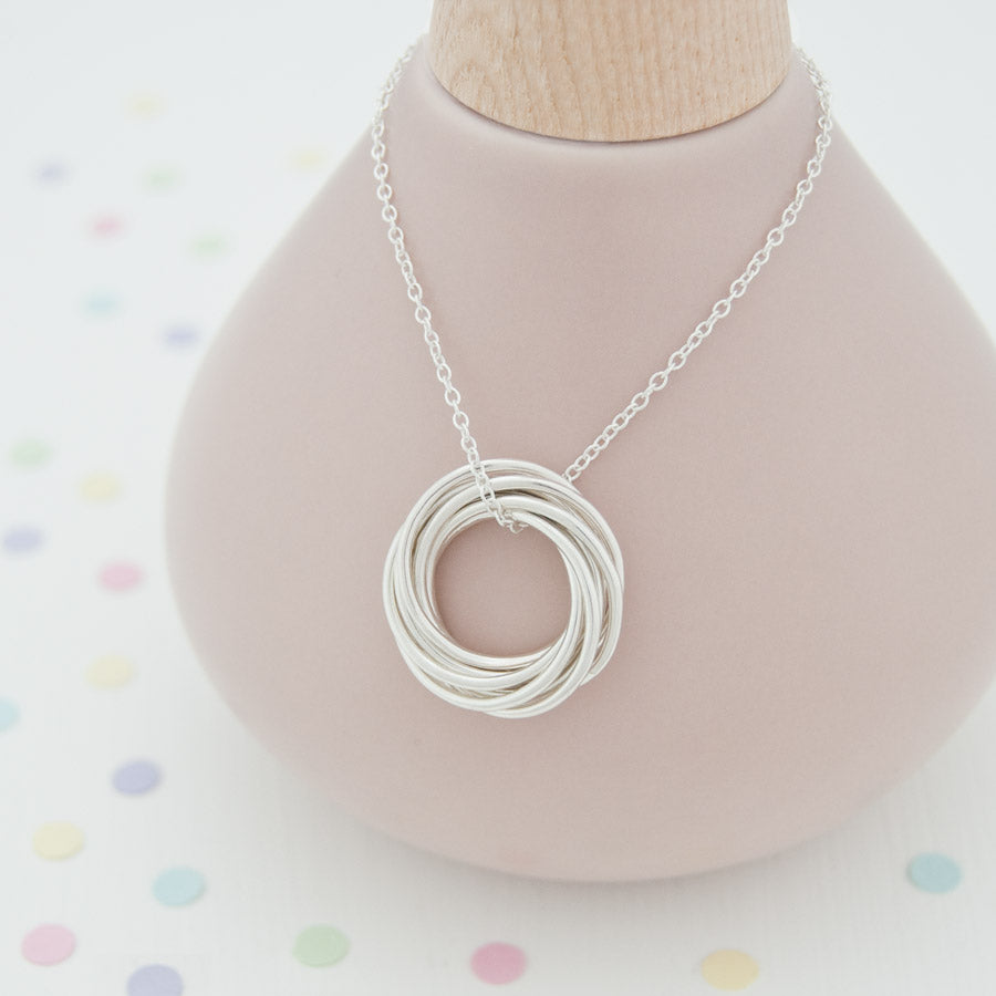 Eight ring shop necklace